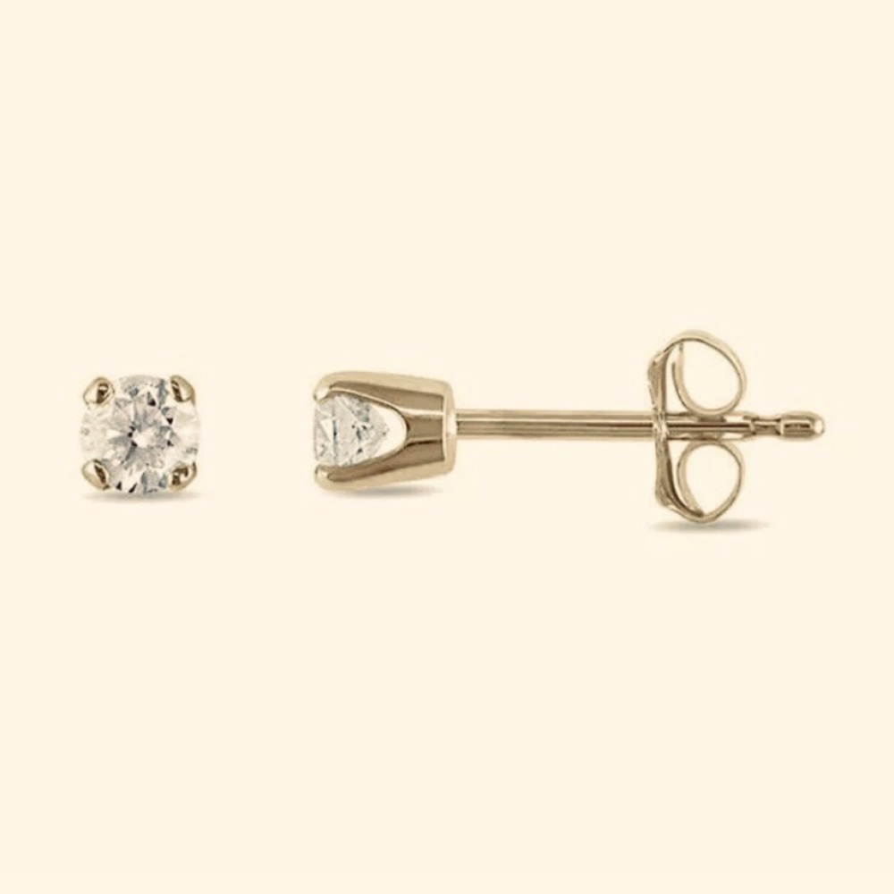 See Photos.Brand New.Pair of diamond 08 total wt.